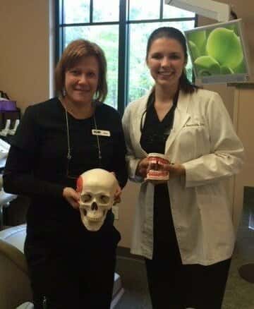 Dr. Reynolds with her dental assistant Kim.